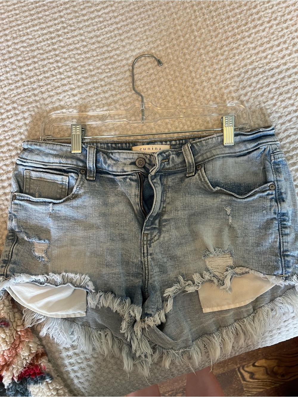eunina Light Blue Distressed Denim Shorts with Frayed Hem